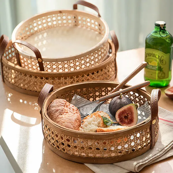 Aufbewahrungskorb aus Rattan mit Lederhenkeln Aufbewahrungskorb aus Rattan mit Lederhenkeln
