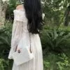 Boho-Handtasche aus handgeflochtenem Rattan, quadratisch Boho-Handtasche aus handgeflochtenem Rattan, quadratisch