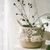 Deko-Korb aus Rattan mit Makramee-Pompon Deko-Korb aus Rattan mit Makramee-Pompon