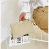 Geflochtene Handtasche mit Trageriemen in Braun Geflochtene Handtasche mit Trageriemen in Braun