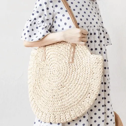 Geflochtene Strandtasche in Naturbeige Geflochtene Strandtasche in Naturbeige