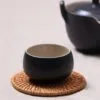 Getränkeuntersetzer-Set aus Rattan