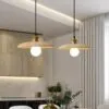 Holz-Hängelampe mit Bogenform Holz-Hängelampe mit Bogenform