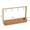 Kompaktes Regal im Rattan-Look mit Haken Kompaktes Regal im Rattan-Look mit Haken