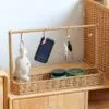 Kompaktes Regal im Rattan-Look mit Haken Kompaktes Regal im Rattan-Look mit Haken