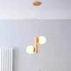 LED-Hängeleuchte mit zwei Holzkugeln