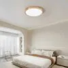 Moderne runde LED-Deckenleuchte mit Holzoptik Moderne runde LED-Deckenleuchte mit Holzoptik