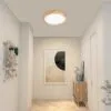 Moderne runde LED-Deckenleuchte mit Holzoptik Moderne runde LED-Deckenleuchte mit Holzoptik