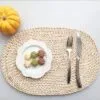Platzset-Set oval im Rattan-Look aus Maisblatt Platzset-Set oval im Rattan-Look aus Maisblatt