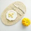 Platzset-Set oval im Rattan-Look aus Maisblatt Platzset-Set oval im Rattan-Look aus Maisblatt