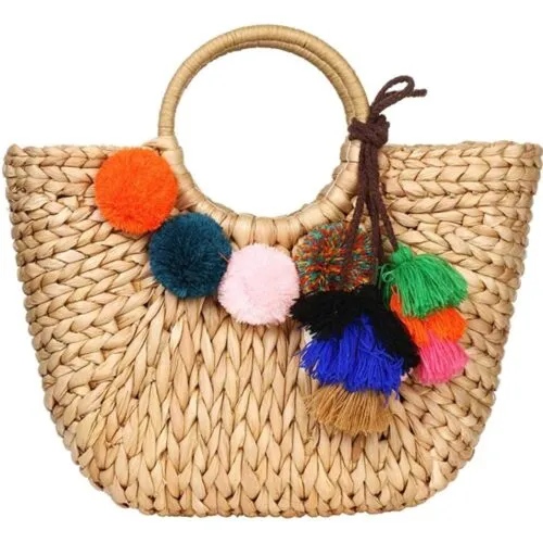 Rattan-Tasche mit Pompons Rattan-Tasche mit Pompons