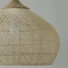 Rund geflochtene Pendelleuchte aus Rattan Rund geflochtene Pendelleuchte aus Rattan