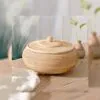 Runder Rattankorb mit handgeflochtenem Deckel Runder Rattankorb mit handgeflochtenem Deckel