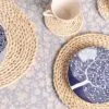 Runder Untersetzer aus geflochtenem Rattan