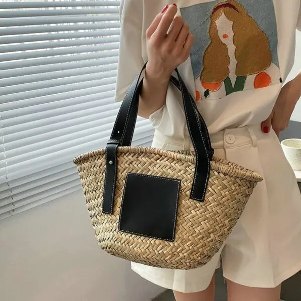 Schwarze Raphiastrandtasche aus gewebtem Stroh für Damen Schwarze Raphiastrandtasche aus gewebtem Stroh für Damen