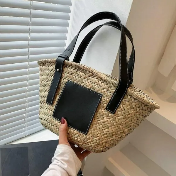 Schwarze Raphiastrandtasche aus gewebtem Stroh für Damen Schwarze Raphiastrandtasche aus gewebtem Stroh für Damen