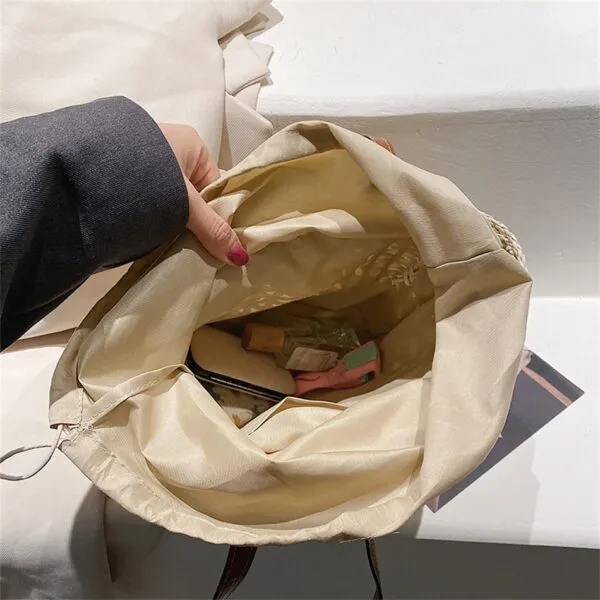Strandtasche aus Naturstroh mit Beige-Details Strandtasche aus Naturstroh mit Beige-Details
