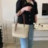 Strandtasche aus Naturstroh mit Beige-Details Strandtasche aus Naturstroh mit Beige-Details