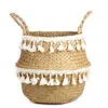 Übertopf aus Rattan mit Spitzenmuster im Nordik-Stil Übertopf aus Rattan mit Spitzenmuster im Nordik-Stil