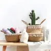 Übertopf aus Rattan mit Spitzenmuster im Nordik-Stil Übertopf aus Rattan mit Spitzenmuster im Nordik-Stil