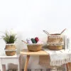 Übertopf aus Rattan mit Spitzenmuster im Nordik-Stil Übertopf aus Rattan mit Spitzenmuster im Nordik-Stil
