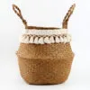 Übertopf aus Rattan mit Spitzenmuster im Nordik-Stil Übertopf aus Rattan mit Spitzenmuster im Nordik-Stil
