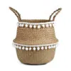 Übertopf aus Rattan mit Spitzenmuster im Nordik-Stil Übertopf aus Rattan mit Spitzenmuster im Nordik-Stil