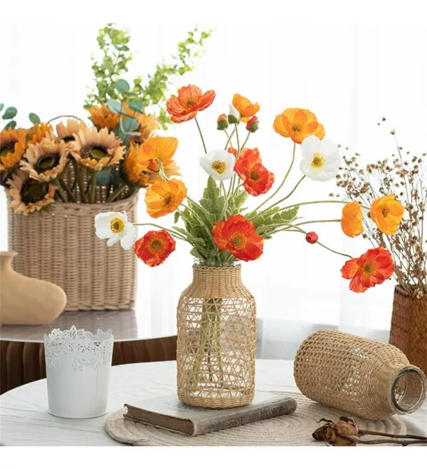 Vase aus Glas und Rattan Vase aus Glas und Rattan