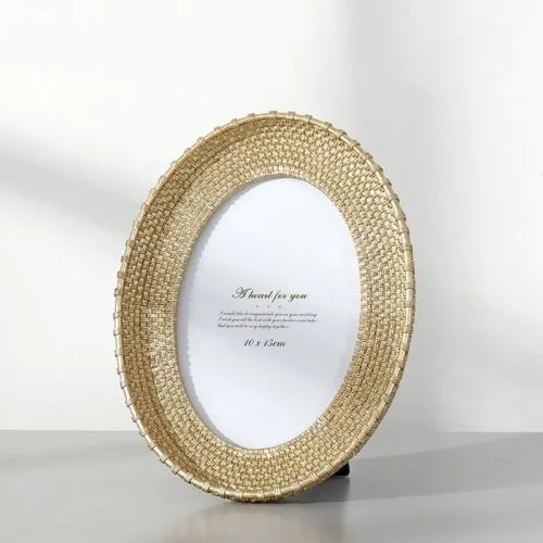 Vintage Bilderrahmen oval aus Rattan Vintage Bilderrahmen oval aus Rattan