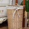 Wäschekorb aus Rattan und Baumwolle Wäschekorb aus Rattan und Baumwolle