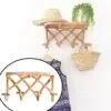 Wandgarderobe mit Ablage aus Rattan Wandgarderobe mit Ablage aus Rattan