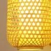 Wandleuchte aus Rattan im Laternenstil Wandleuchte aus Rattan im Laternenstil