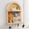 Wandregal aus Rattan mit Haken Wandregal aus Rattan mit Haken